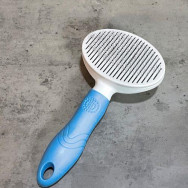 Пуходірка для вичісування вовни собак і кішок, що самоочищається з блакитною ручкою Пуходірка для вичісування вовни собак і кішок, що самоочищається з блакитною ручкою